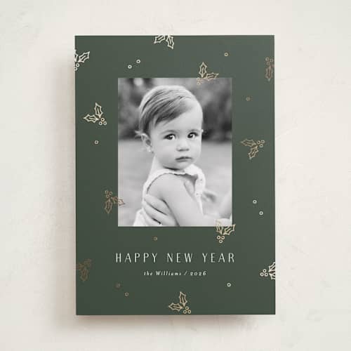 This is a evergreen foil pressed holiday cards with foil pressed by Michelle Taylor called jolly holly printing on recycled smooth signature in standard