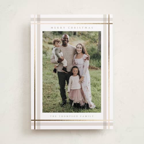 This is a tan foil pressed holiday cards with foil pressed by Ashley Presutti Beasley called traditional plaid printing on recycled smooth signature in standard