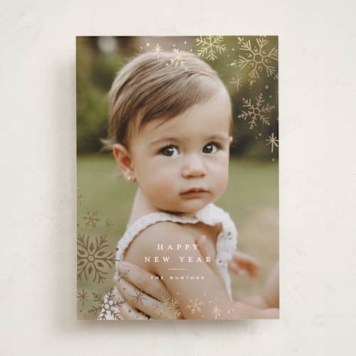 This is a snow foil pressed holiday cards with foil pressed by Wildfield Paper Co called glistening snow printing on recycled smooth signature in standard