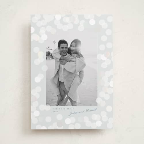 This is a frost gloss press holiday cards with gloss press by Claudia Orengo called lights printing on recycled smooth signature in standard