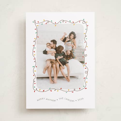 This is a frosting holiday photo cards with standard by Holly Whitcomb called crazy lights printing on recycled smooth signature in standard