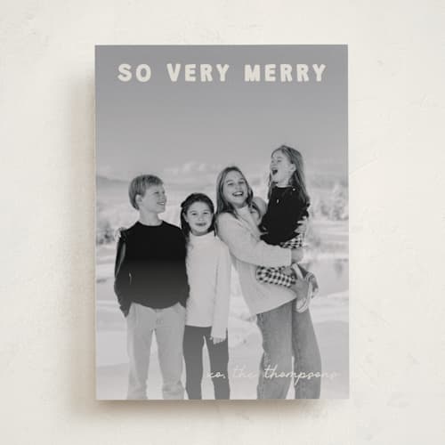 This is a cream holiday photo cards with standard by Jenny Millington called merry greeting printing on recycled smooth signature in standard
