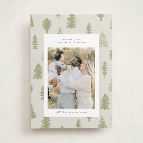 This is a greenery holiday photo cards with standard by Heather Cairl called all evergreen printing on recycled smooth signature in standard