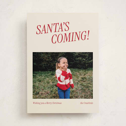This is a candy cane holiday photo cards with standard by Angela Garrick called santa's coming printing on recycled smooth signature in standard