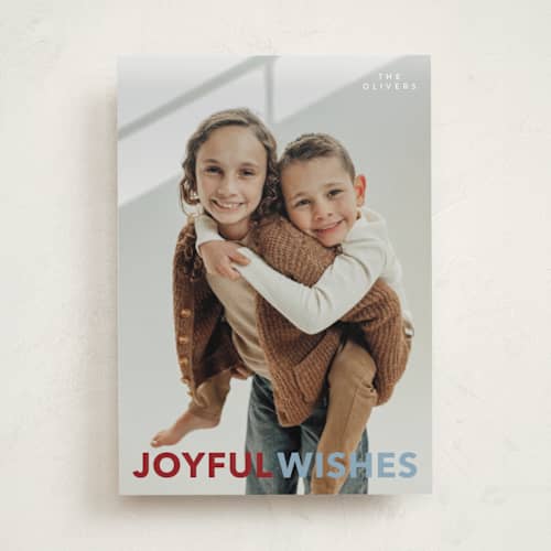 This is a cardinal holiday photo cards with standard by Angela Thompson called most merry printing on recycled smooth signature in standard