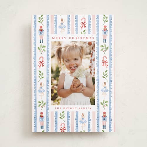 This is a blue spruce holiday photo cards with standard by Sarah Knight called nutcracker pattern printing on recycled smooth signature in standard