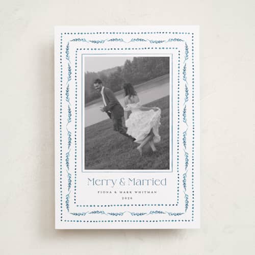 This is a celestial holiday photo cards with standard by Erika Firm called nostalgic ribbon border printing on recycled smooth signature in standard