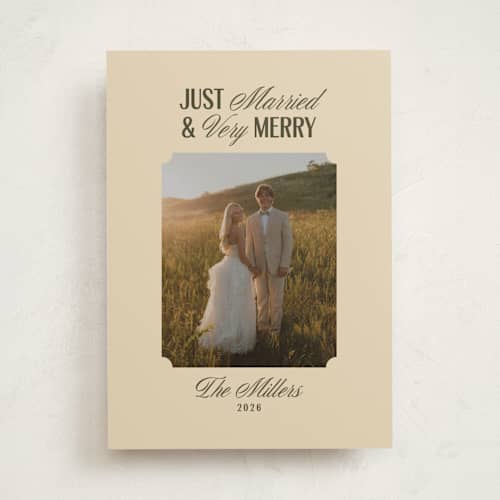 This is a ivory holiday photo cards with standard by Ana de Sousa called just married & merry printing on recycled smooth signature in standard