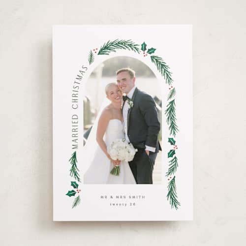 This is a snow holiday photo cards with standard by Hooray Creative called a married christmas printing on recycled smooth signature in standard