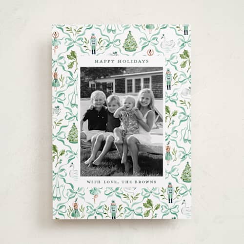 This is a sweet mint holiday photo cards with standard by Sarah Knight called nutcracker ribbons printing on recycled smooth signature in standard