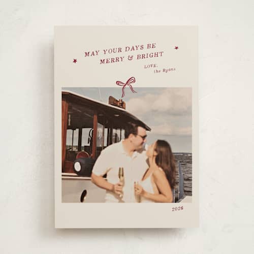 This is a cinnamon holiday photo cards with standard by Ani Somi called merry little bow printing on recycled smooth signature in standard