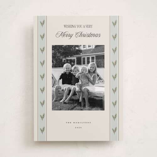 This is a wintermint holiday photo cards with standard by Benita Crandall called holly pattern printing on recycled smooth signature in standard