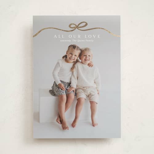 This is a sugar foil stamped valentine cards with foil pressed by Kaydi Bishop called bow tied printing on recycled smooth signature in standard