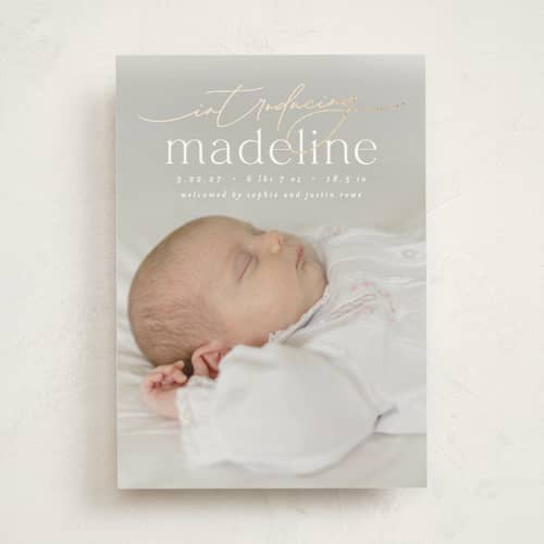This is a parchment foil stamped birth announcements with foil pressed by Everett Paper Goods called mist printing on signature in standard
