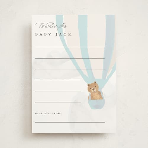 This is a blue berry baby shower game activity cards with standard by Teju Reval called hot air balloon bear printing on signature in standard