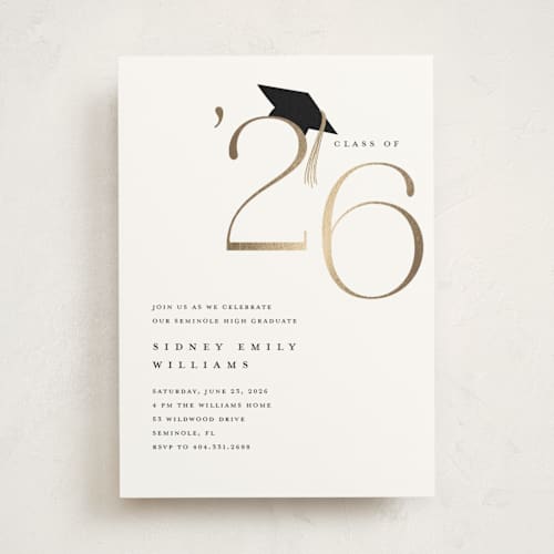 This is a cotton graduation invitations with foil pressed by Stacey Meacham called cap and year printing on signature in standard