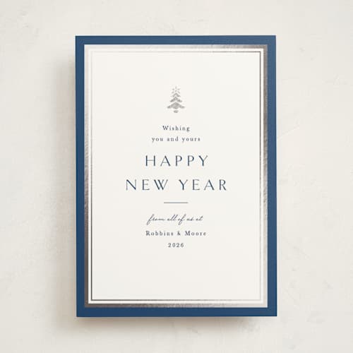 This is a blue spruce business holiday cards with foil pressed by Amy Kross called edged printing on signature in standard