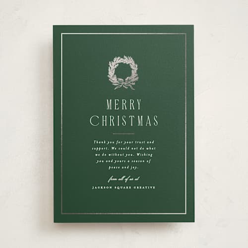 This is a pine business holiday cards with foil pressed by Amy Kross called magnolia printing on signature in standard