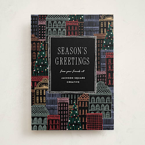 This is a eclipse business holiday cards with standard by Pixel and Hank called holiday city printing on signature in standard