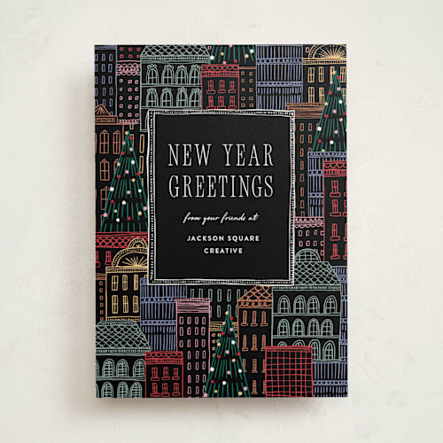 This is a eclipse business holiday cards with standard by Pixel and Hank called holiday city printing on signature in standard