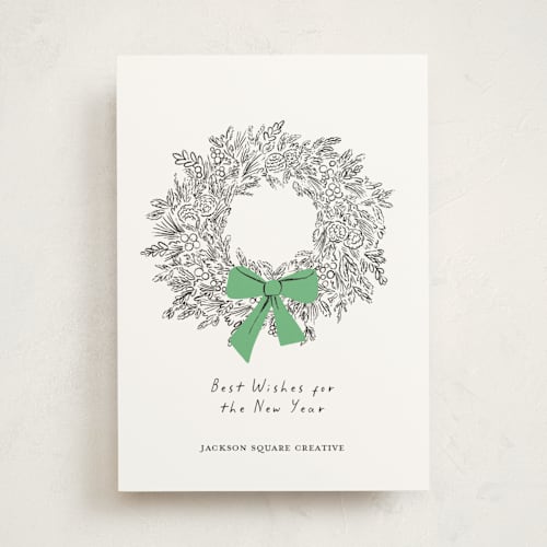 This is a greenery business holiday cards with standard by mo kelley called wreath with bow printing on signature in standard