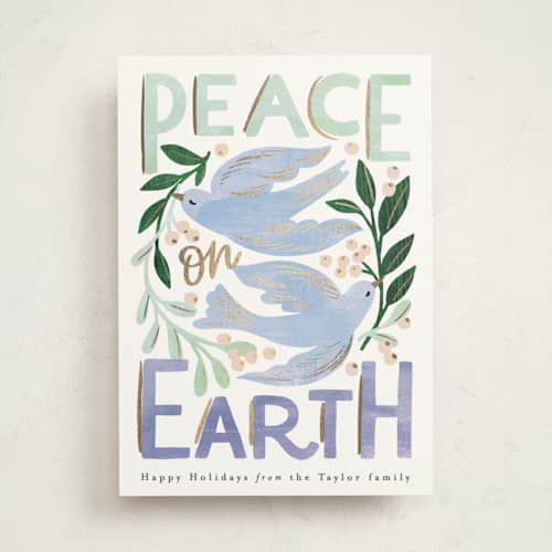 This is a periwinkle foil pressed holiday cards with foil pressed by Alethea and Ruth called peace on earth birds printing on signature in standard