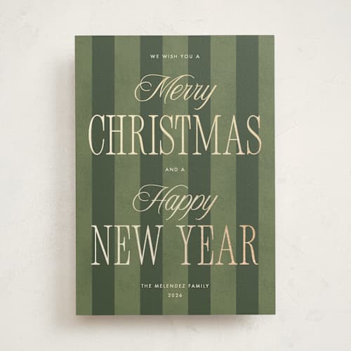 This is a pine foil pressed holiday cards with foil pressed by Robert and Stella called striped type printing on signature in standard