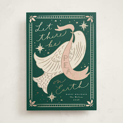 This is a evergreen foil pressed holiday cards with foil pressed by Erin German called peace on earth dove printing on signature in standard