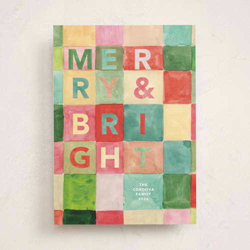 This is a pine non photo holiday cards with standard by Lindsay Megahed called bright blocks printing on signature in standard