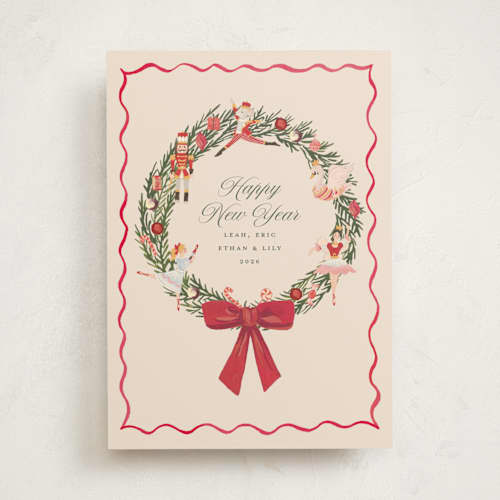 This is a berry non photo holiday cards with standard by Teju Reval called nutcracker wreath printing on signature in standard
