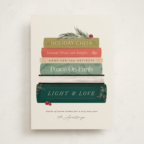 This is a holly jolly non photo holiday cards with standard by Kate Ahn called book stack printing on signature in standard