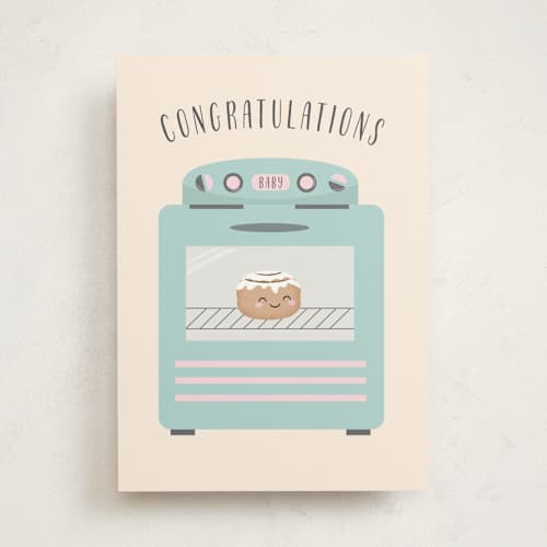 This is a beige new baby greeting cards with standard by Annie Holmquist called bun in the oven printing on signature in greeting cards