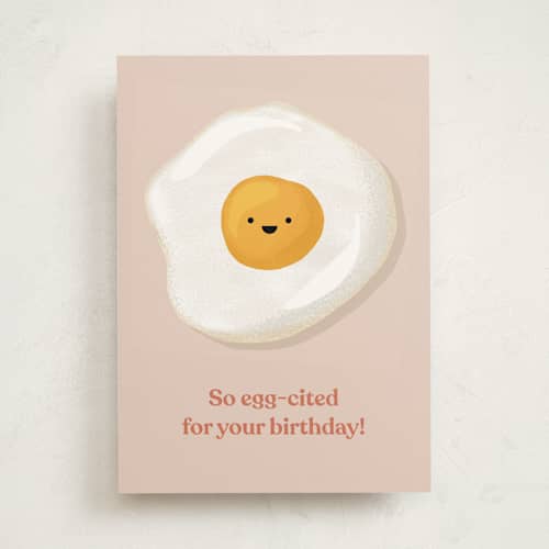 This is a eggshell birthday cards with standard by Laura Bercovich called eggcellent birthday printing on signature in greeting cards