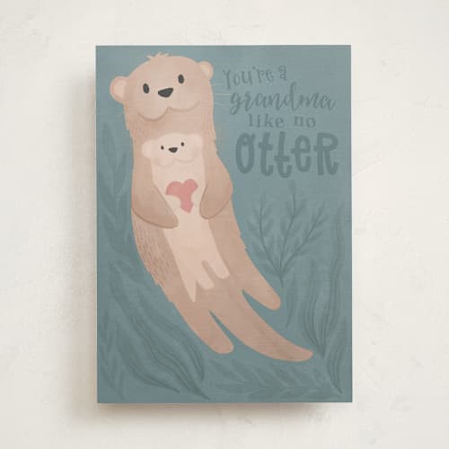 This is a aquamarine greeting cards with standard by Jessie Steury called momma otter printing on signature in greeting cards