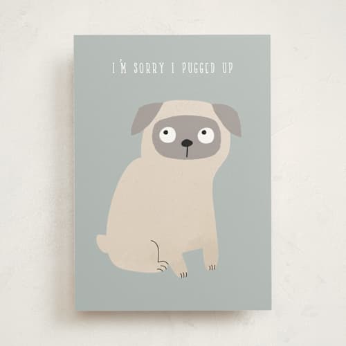 This is a dusty blue greeting cards with standard by Angela Thompson called pugged up printing on signature in greeting cards
