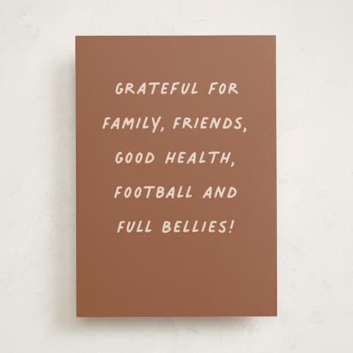 This is a caramel greeting cards with standard by Hooray Creative called full bellies printing on signature in greeting cards