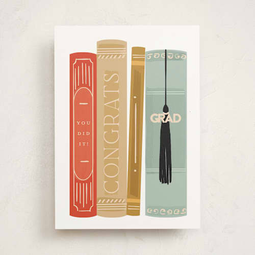 This is a book graduation cards with standard by Rebecca Durflinger called bookshelf printing on signature in greeting cards