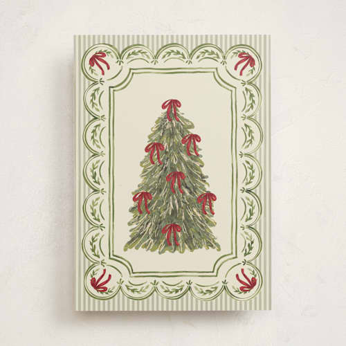 This is a festive fir greeting cards with standard by Chris Griffith called holiday bow tree printing on signature in greeting cards