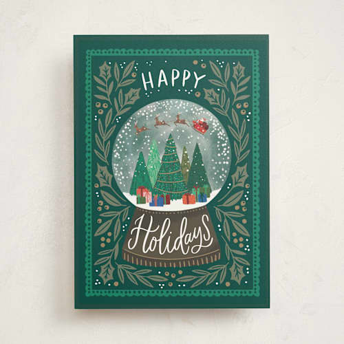 This is a wreath greeting cards with standard by Alethea and Ruth called holiday snow globe printing on signature in greeting cards