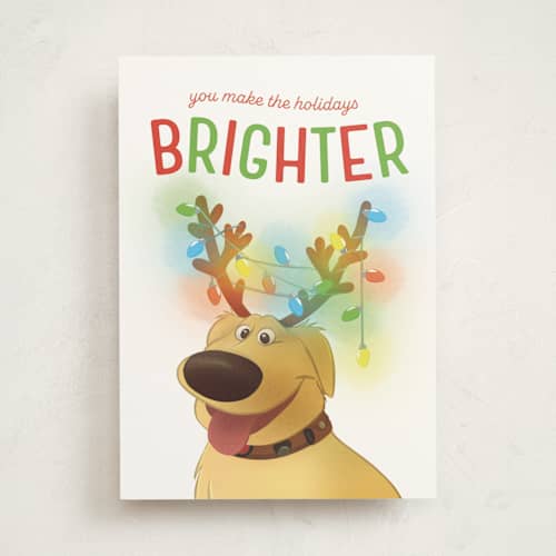 This is a buttercup greeting cards with standard by Kristen Boban called disney and pixar's brighter holidays printing on signature in greeting cards