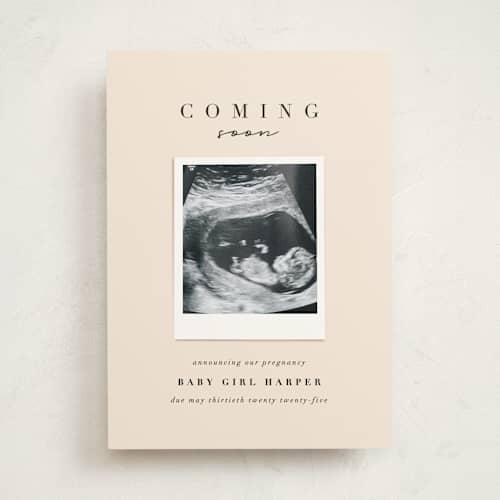 This is a peach pregnancy announcements with standard by Lori Wemple called coming soon snap printing on signature in standard