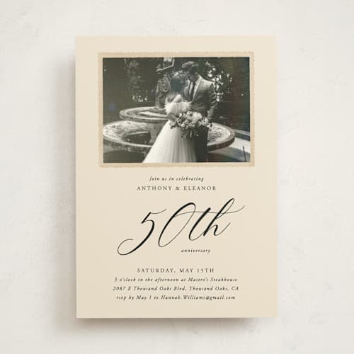 This is a golden party invitations with standard by Kamala Nahas called vintage photo printing on signature in standard