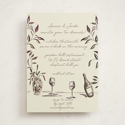 This is a cream party invitations with standard by West Foglia called vine, wine, and dine printing on signature in standard