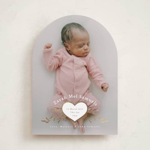 This is a snow foil stamped birth announcements with foil pressed by letterfix called heart crest printing on recycled smooth signature in standard