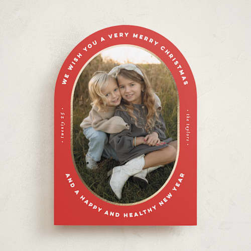 This is a poinsettia foil pressed holiday cards with foil pressed by Erica Krystek called oval frame printing on recycled smooth signature in standard