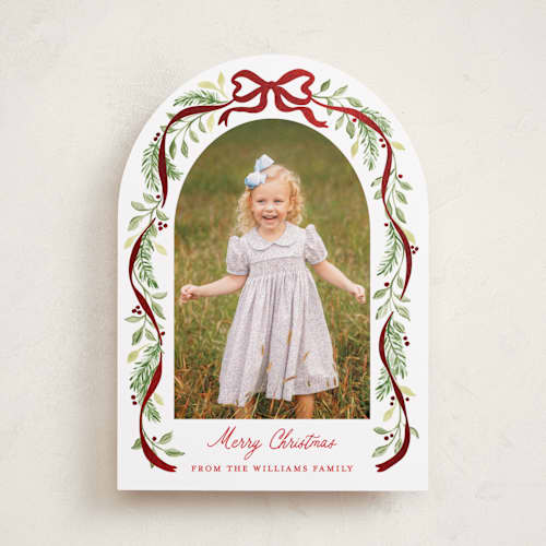 This is a cardinal foil pressed holiday cards with foil pressed by Sarah Knight called ribbon arch printing on recycled smooth signature in standard