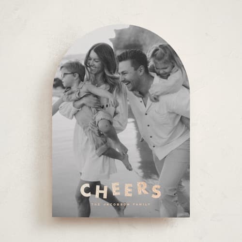 This is a champagne foil pressed holiday cards with foil pressed by Ellen Schlegelmilch called glitter cheers printing on recycled smooth signature in standard