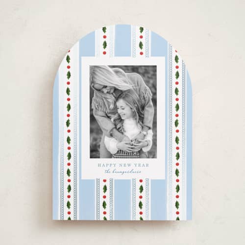 This is a robin's egg foil pressed holiday cards with foil pressed by Baumbirdy called holly frames printing on recycled smooth signature in standard