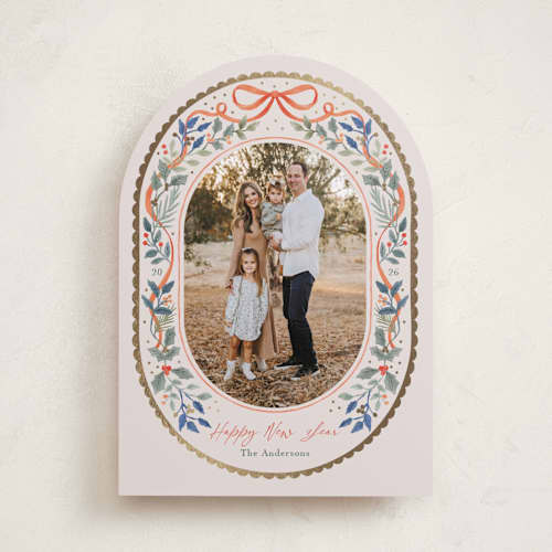 This is a holly foil pressed holiday cards with foil pressed by Elly called a gentle bow printing on recycled smooth signature in standard