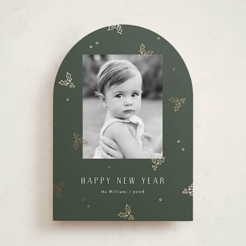 This is a evergreen foil pressed holiday cards with foil pressed by Michelle Taylor called jolly holly printing on recycled smooth signature in standard